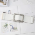 Macro detail of white elastic waist belt with luxury rhinestone encrusted rectangular buckle - White