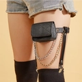 Detail of punk style black quilted leather leg bag with gold and silver metal chains - Black Quilted Pattern