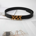 Detail of a black leather belt featuring three gold-tone X-shaped buckle rings on a desk - 105cm / Black