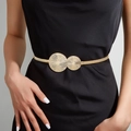 Elegant gold elastic waist chain with double circle sunburst buckle on black dress - Striped Buckle Spring Belt / Gold