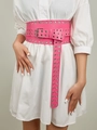 Close-up of bright pink wide elastic waist belt with triple row silver metal eyelets - Plum Red