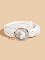 Detail of white woven belt with silver oval buckle and minimalist textured pattern - White