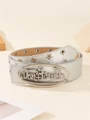 Détail d'une ceinture argentée Y2K à strass avec boucle Don't Touch et motifs étoiles - Argenté