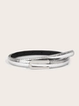 Detailed macro view of silver embossed leather belt with metal buckle and stitching - Crocodile Pattern Silver
