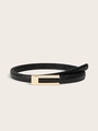 Detail view of black crocodile pattern thin leather belt with gold metal rectangular buckle - Crocodile Pattern Black
