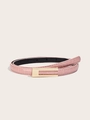 Detail of pink croc-embossed leather belt with a minimalist gold rectangular buckle - Crocodile Pink