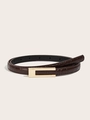 Detail of slim dark brown belt with crocodile pattern and minimalist gold buckle - Crocodile Coffee