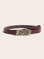 Détail d'une ceinture en cuir bordeaux foncé avec boucle dorée en forme de deux roses - Rouge Vin Boucle Rose