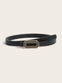 Détail d'une fine ceinture noire avec boucle ovale dorée vintage au fini gaufré à pois - Noir Boucle Ovale