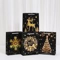 Sacchetti regalo di Natale in carta neri e oro con renne e fiocchi di neve, set di 4 pezzi - Stile Misto Natalizio (T004) / 24*18*8
