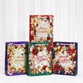 Set of four colorful Merry Christmas paper gift bags with handles and festive floral prints - Mixed Color (T003)