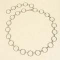 Detail of silver metal chain belt featuring circular rings and lobster clasp closure - Silver without Extension Chain
