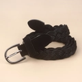 Close-up of black braided women's belt with gunmetal pin buckle and suede leather details - Black