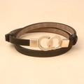 Detail view of a black slim leather belt with a minimalist golden double ring buckle design - 110cm / Black