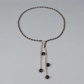 Elegant gold metal chain belt with black leather weave and hanging beaded tassels - Black Ball Pendant Style