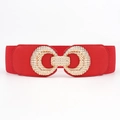 Detail of red elastic waist belt featuring a textured interlocking gold metal buckle - 65cm / Red