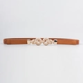 Detail of thin brown elastic belt with golden interlocking knot buckle for dresses - Camel / 65 cm