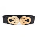 Dettaglio della fibbia intrecciata dorata vintage e della cintura elastica nera da donna - Nero