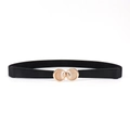 Slim elastic waist belt for women with golden rose buckle and cat eye stone detail - Black