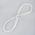 Detail view of double-row pearl waist chain with a rose gold rhinestone bow buckle - Gold Rhinestone Bowknot Buckle (HYY19155)
