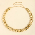 Dettaglio della cintura a catena dorata con grandi maglie ovali e chiusura a moschettone - Oro (2.5cm)