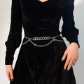 Detail of silver multilayer chain belt with thick rings and fine drapes on black velvet dress - Lock Waist Chain / Silver
