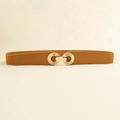 Detail of a thin brown elastic belt with leather stitching and golden interlocking buckle - Camel