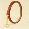 Elegant brown leather waist belt with artistic golden twisted buckle for dresses and coats - Tan