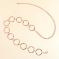 Détail d'une chaîne de taille en métal rose doré avec de grands cercles géométriques - L / Or rose