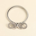 Detail view of silver stretch metal belt with interlocking textured double ring buckle - Interlocking Ring Design (19352)