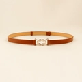 Elegant thin brown leather belt for women featuring a gold infinity buckle and stitch detail - 19330 Camel
