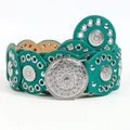 Detail of teal leather bohemian belt featuring silver mandala studs and metal eyelets - Turquoise With Silver Buckle