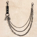 Macro view of triple-layered dark gray punk metal wallet chains with leather rivet accents - Triple Layer Rivet Style (19144) / Gunmetal