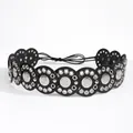 Detail of vintage ethnic belt with embossed metal medallions and silver rivets on black disks - 817 Bright Silver Black