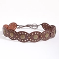 Close-up of bohemian leather belt with oval panels and intricate metal embossed studs - 814 Antique Bronze Brown