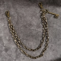 Catena doppia vintage per pantaloni in bronzo con ciondolo chiave retro e chiusure punk - 19154 Bronzo