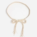 Close-up of braided cream waist rope with decorative bow knot and long tassel details - Tassel Woven Style (Y584) / Beige