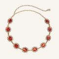 Dettaglio catena vintage in oro con gemme rosse ovali e decorazioni in filigrana fine - Oro