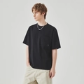 T-shirt uomo nera ampia con taschino sul petto, stile minimalista in cotone morbido - S / Nero
