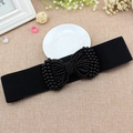 Cintura elastica nera da donna con grande fiocco decorato con perle nere lucide - Nero