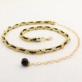 Elegante cintura a catena d'oro ritorta e perle nere per abiti da donna - Nero