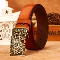 Cintura in pelle marrone arancio vintage con goffratura floreale e fibbia in ottone traforata - Cammello