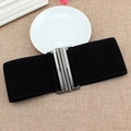 Women's black elastic waist belt featuring a modern silver interlocking geometric buckle - Black / 75cm