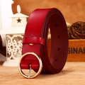 Women's deep red leather belt with circular golden metal buckle and adjustment holes - Red
