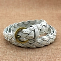 White woven leather belt for women with a vintage bronze round buckle and detailed stitching - White