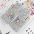 Gray thick knit mittens for women featuring a pink bow and colorful pom-poms accents - Medium Grey