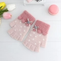 Pink half-finger plush gloves for kids featuring white polka dots and a cute bow tie - Dusky Pink