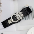 Elastic wide black belt for women featuring a sparkling silver flower rhinestone buckle - Gorgeous Floral Leaf Style (EL223-3)