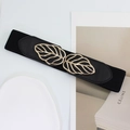 Cintura elastica nera da donna con fibbia a foglia dorata e dettagli in pelle - Nero