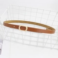 Minimalist slim brown leather belt with an oval matte gold metal buckle for women - Camel